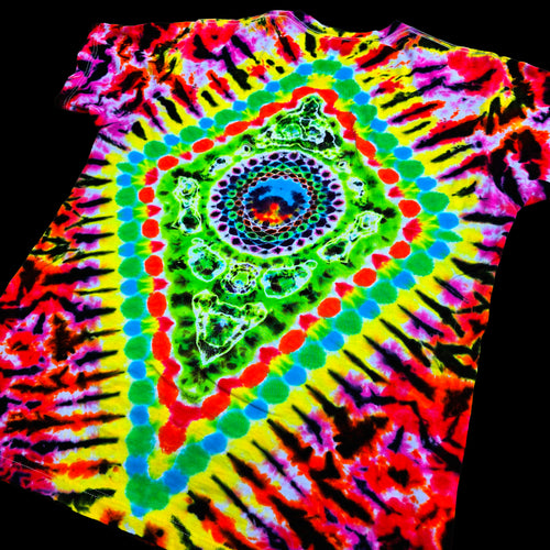 A vibrant tie-dye t-shirt featuring a psychedelic spiral pattern with concentric rings of green, blue, red, and yellow radiating from the center, set against a solid black background.