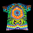 A short-sleeve crewneck t-shirt featuring a vibrant, multicolor tie-dye pattern with a central mandala and radial sunburst design, shown against a solid black background.
