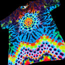 A short-sleeve tie-dye t-shirt featuring a vibrant spiral mandala pattern with neon blue, green, yellow, orange, and purple hues, displayed against a solid black background.
