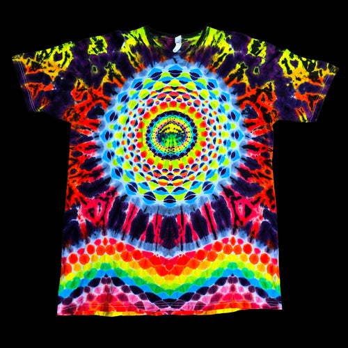 A short-sleeve tie-dye t-shirt featuring a vibrant, symmetrical mandala design with a rainbow spectrum of neon colors on a solid black background.