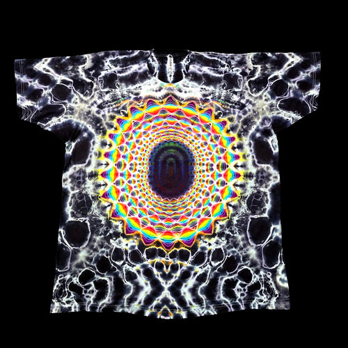 A short-sleeve t-shirt featuring a highly detailed, symmetrical psychedelic graphic. The design has a black and white cellular or web-like pattern with a central multicolor tunnel effect containing concentric rings of yellow, green, blue, and red leading to a dark center, all set against a solid black background.