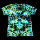 A short-sleeve crewneck t-shirt featuring a vibrant, symmetrical tie-dye pattern with neon green, blue, and black wavy lines, displayed flat against a solid black background.