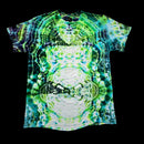 A short-sleeve crewneck t-shirt featuring a vibrant, symmetrical tie-dye pattern in neon green, lime, and white with dark accents, displayed flat against a solid black background.