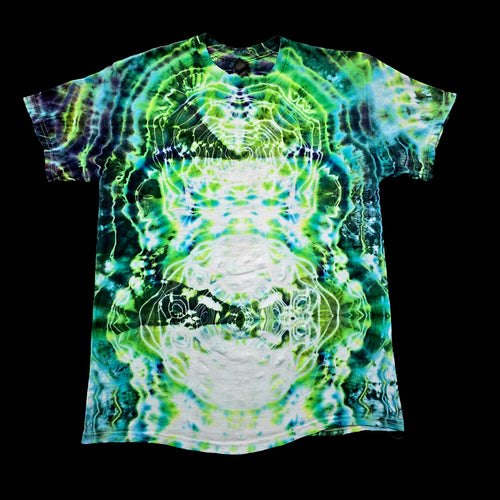 A short-sleeve crewneck t-shirt featuring a vibrant, symmetrical tie-dye pattern in neon green, lime, and white with dark accents, displayed flat against a solid black background.