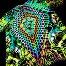 A short-sleeve crewneck t-shirt featuring a vibrant, psychedelic neon pattern with a central rainbow arch, diamond grid, and abstract organic shapes on a black background.