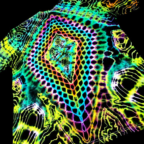 A short-sleeve crewneck t-shirt featuring a vibrant, psychedelic neon pattern with a central rainbow arch, diamond grid, and abstract organic shapes on a black background.