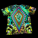 A black short-sleeve T-shirt with a highly vibrant, multicolor psychedelic diamond mandala print in neon green, yellow, purple, blue, and orange.