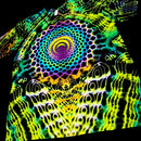 A black short-sleeve T-shirt with a highly vibrant, multicolor psychedelic spiral mandala print in neon green, yellow, purple, blue, and orange.