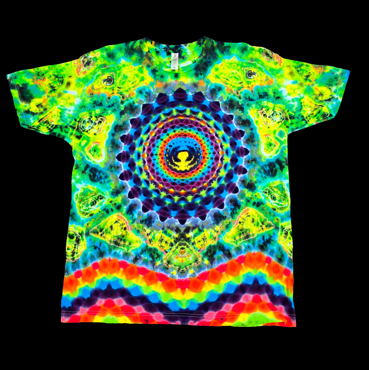 A short-sleeve crewneck t-shirt featuring a vibrant, multicolor psychedelic tie-dye design with a central mandala pattern and rainbow stripes at the bottom, displayed flat against a solid black background.
