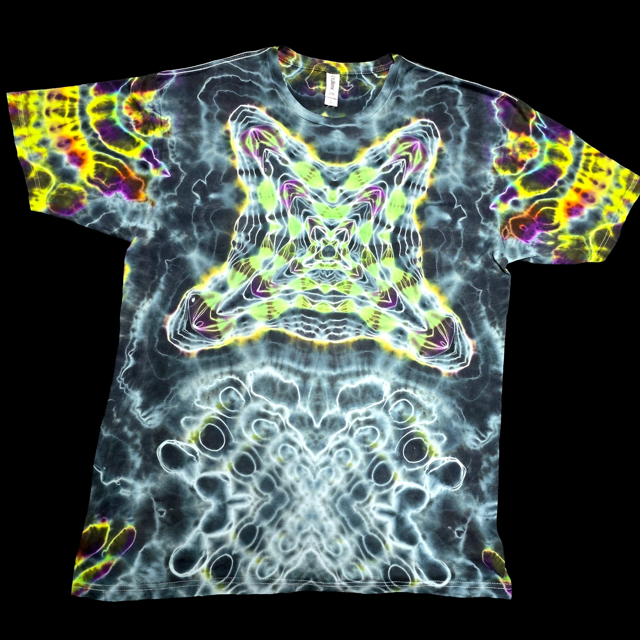 A short-sleeve crewneck t-shirt featuring a psychedelic, kaleidoscopic abstract pattern with a central star-like motif and swirling neon colors, displayed flat against a solid black background.