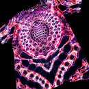 A short-sleeve t-shirt featuring a vibrant, psychedelic tie-dye pattern with glowing neon pink, purple, and white lines over a black base, shown against a solid black background.