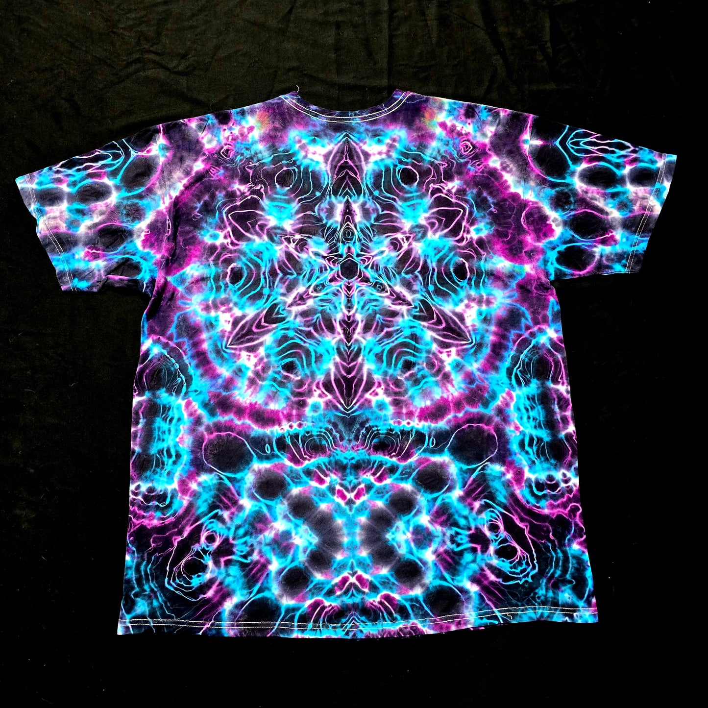 Back view showing mirrored Hyper Fractal pattern in electric blue and purple tones