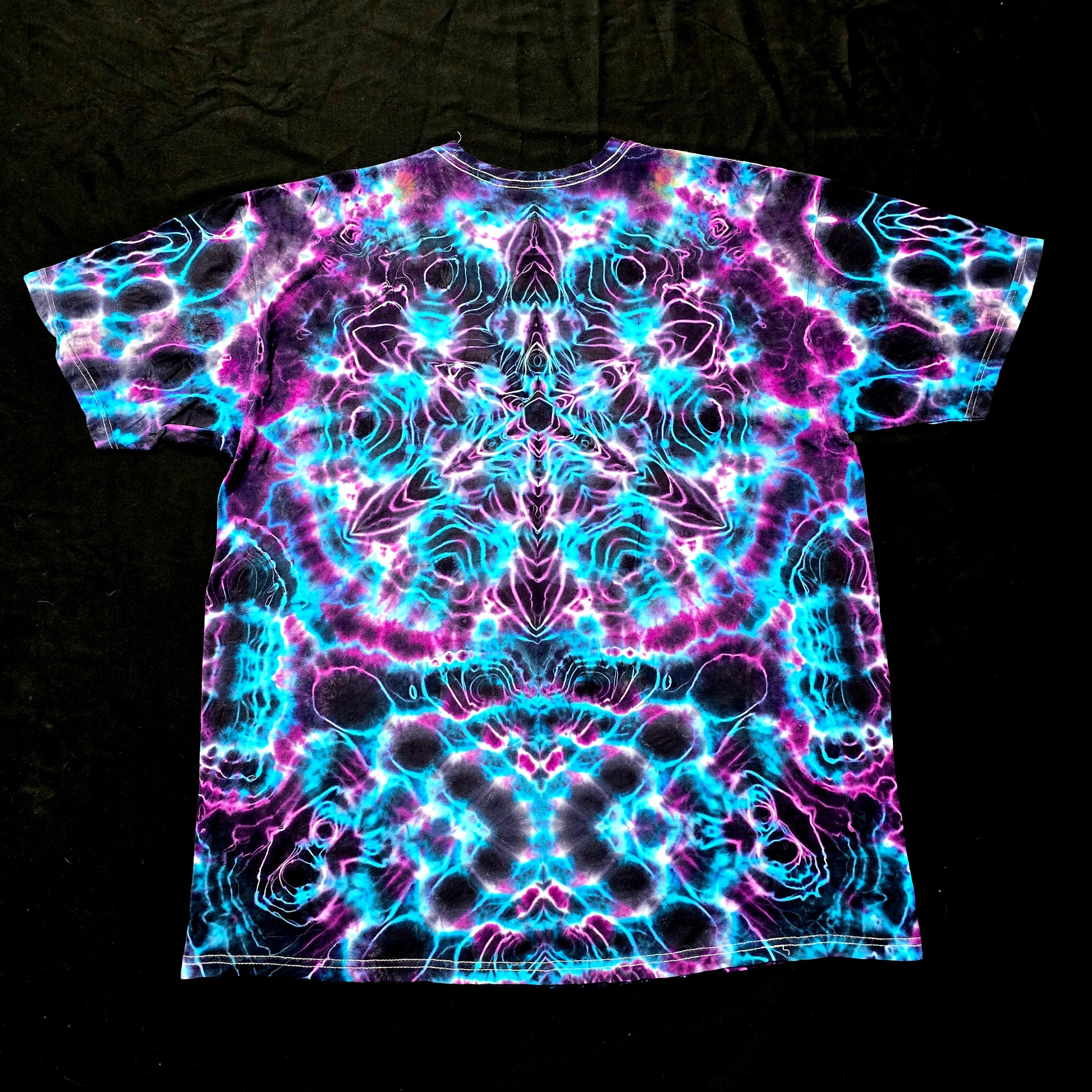 Back view showing mirrored Hyper Fractal pattern in electric blue and purple tones