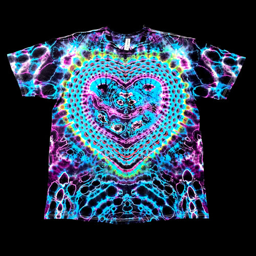 A short-sleeve crewneck t-shirt featuring a vibrant, symmetrical psychedelic heart design in neon cyan, magenta, and lime green over a black base, shown flat against a solid black background.