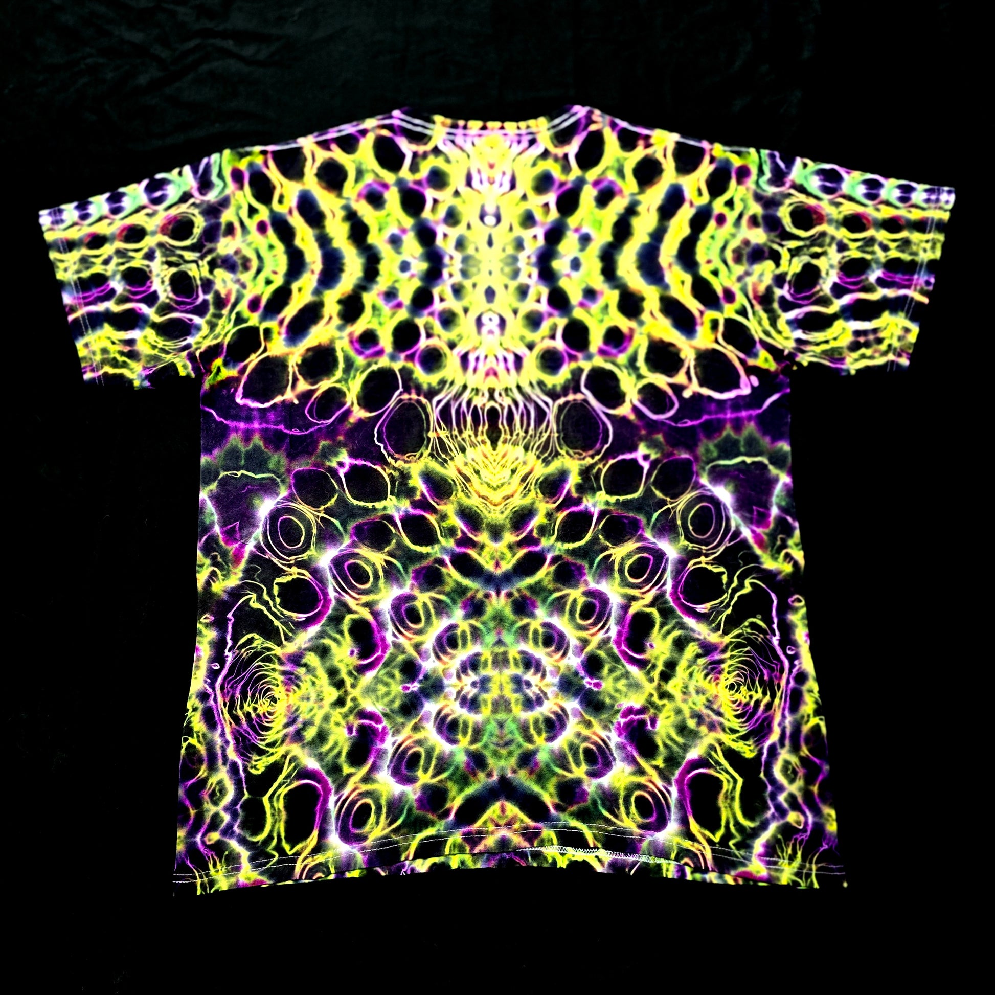One-of-one handmade tie-dye shirt with symmetrical neon fractal design, back view