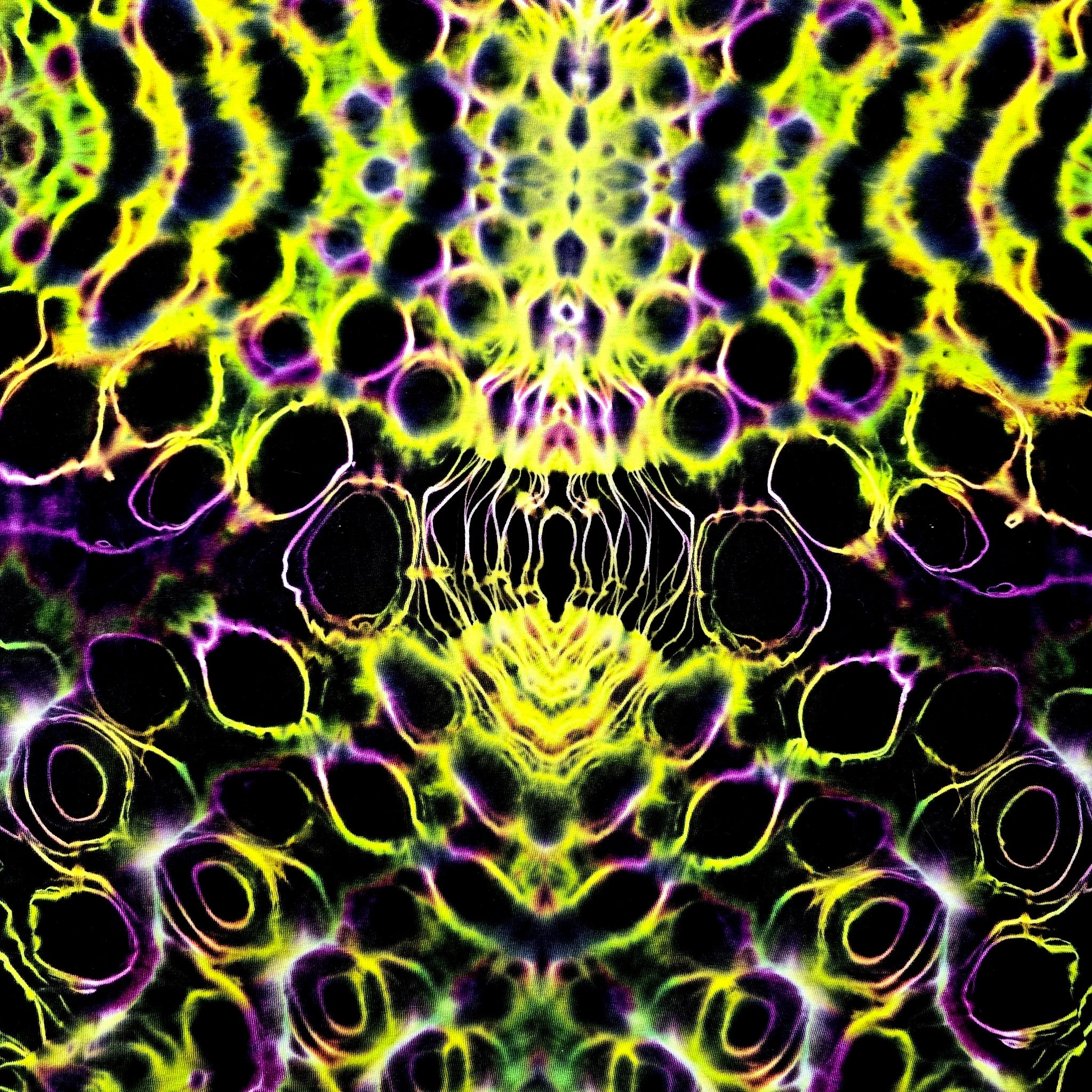 A symmetrical, kaleidoscopic abstract pattern with neon yellow-green, black, and purple circular and wavy motifs filling the frame.
