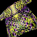Neon patterned fabric with purple and yellow colors on a black background