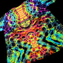 A short-sleeve t-shirt featuring a highly vibrant, psychedelic tie-dye pattern with neon colors including pink, yellow, green, blue, and purple on a black base, shown against a solid black background.