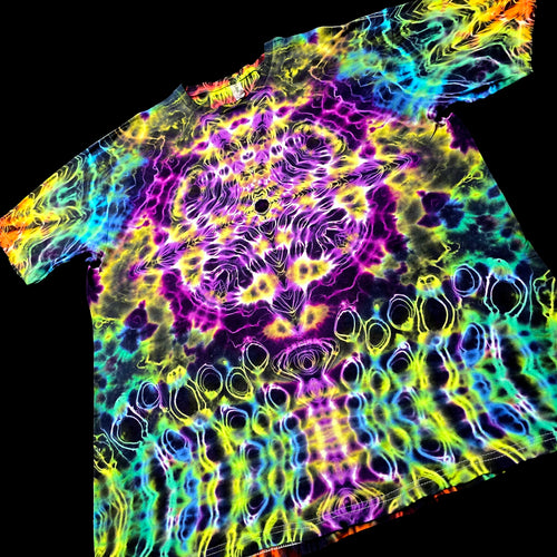 A short-sleeve crewneck t-shirt featuring a vibrant, psychedelic tie-dye pattern with neon swirls of purple, yellow, green, blue, and orange on a black base.