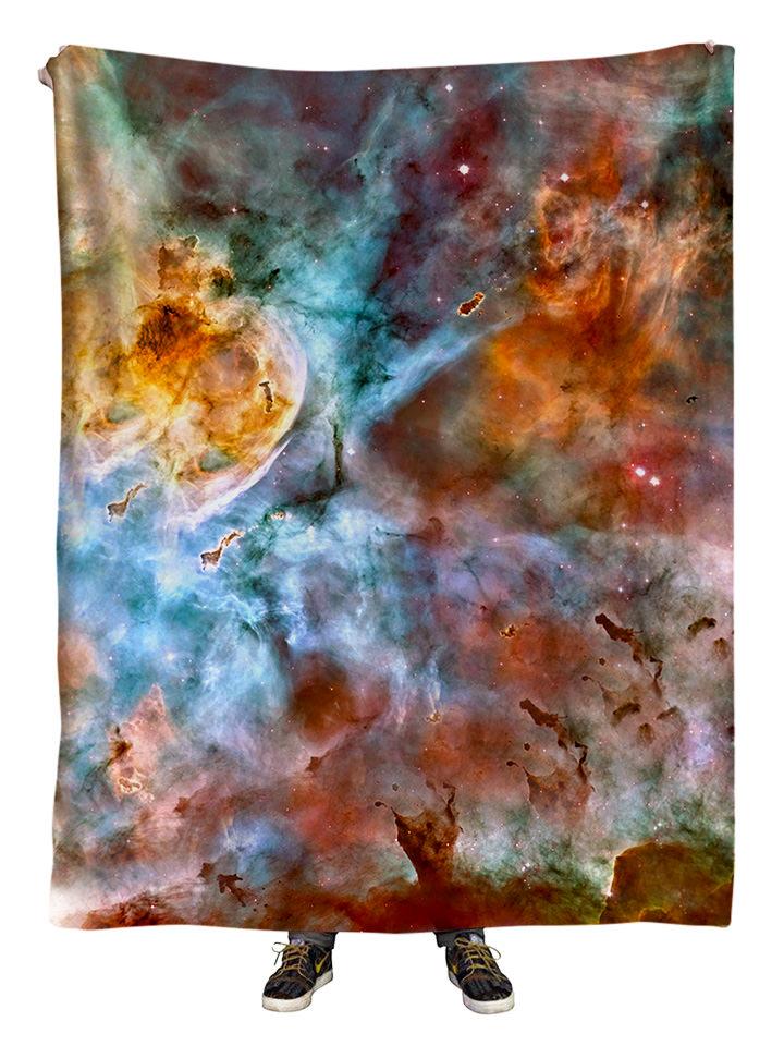 Hanging view of all over print orange & blue galaxy blanket by GratefullyDyed Apparel.