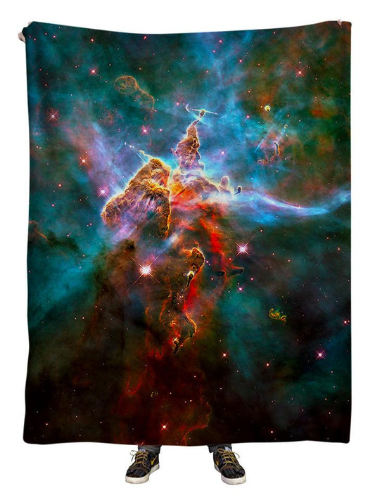 Hanging view of all over print rainbow nebula galaxy blanket by GratefullyDyed Apparel.