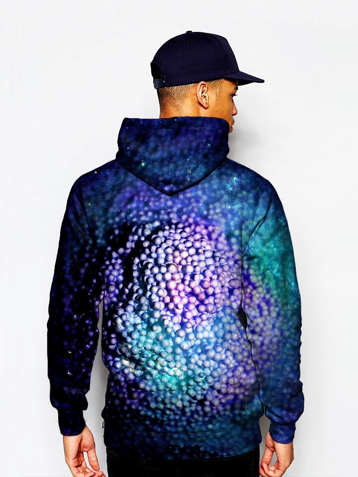 Model in blue and purple dots all over print pullover hoodie back view