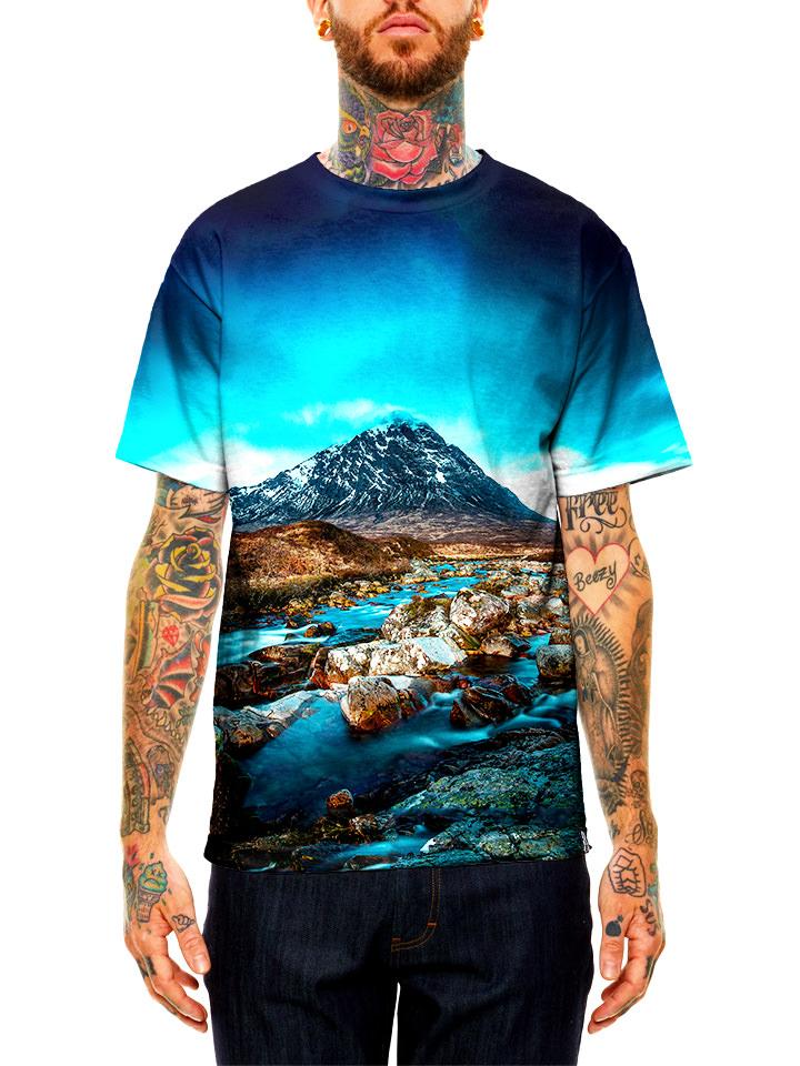 Model wearing GratefullyDyed Apparel brown & blue mountain river unisex t-shirt.