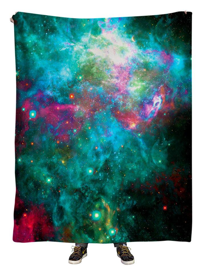 Hanging view of all over print pink & teal galaxy blanket by GratefullyDyed Apparel.