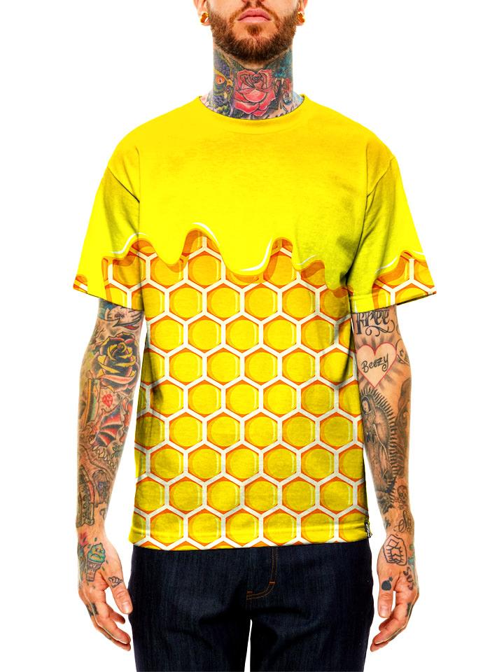 Model wearing GratefullyDyed Apparel yellow & gold dripping honeycomb unisex t-shirt.