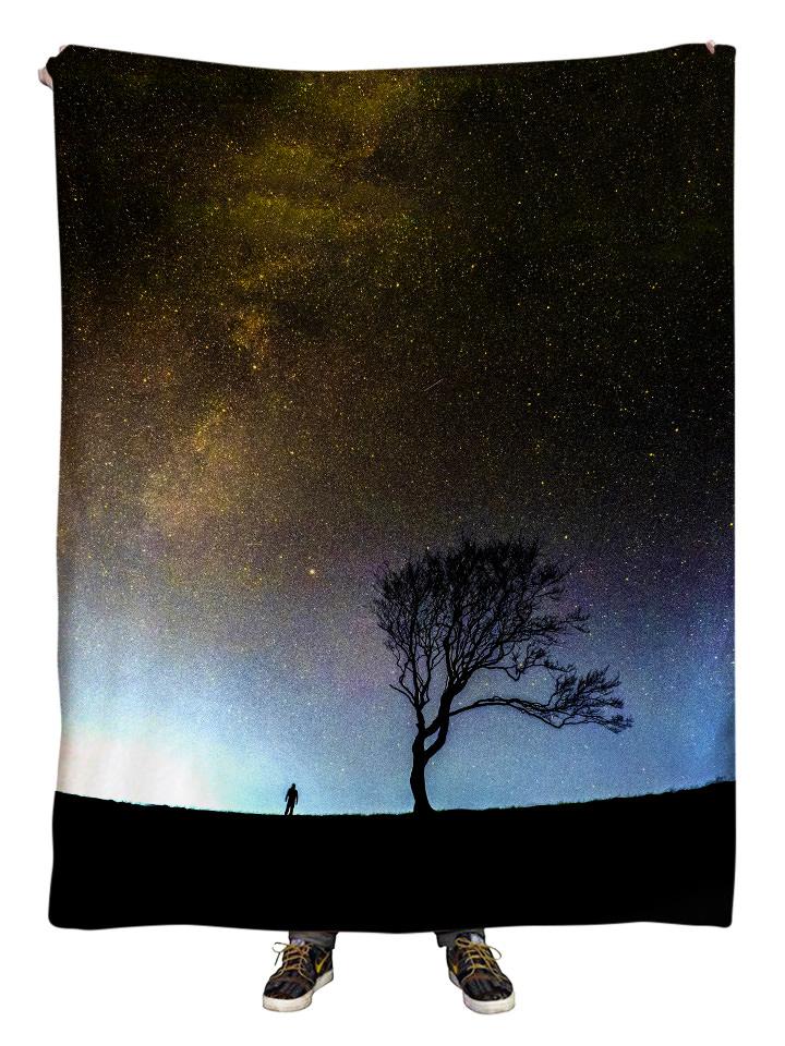 Hanging view of all over print gray galaxy with black tree blanket by GratefullyDyed Apparel.