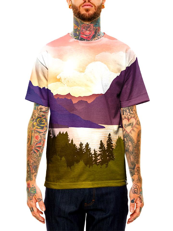 Model wearing GratefullyDyed Apparel pink, purple & green forest mountain valley unisex t-shirt.