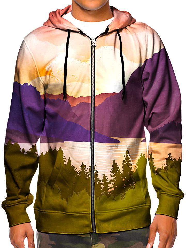 Model wearing GratefullyDyed Apparel psychedelic pink, purple & green forest mountain zip-up hoodie.