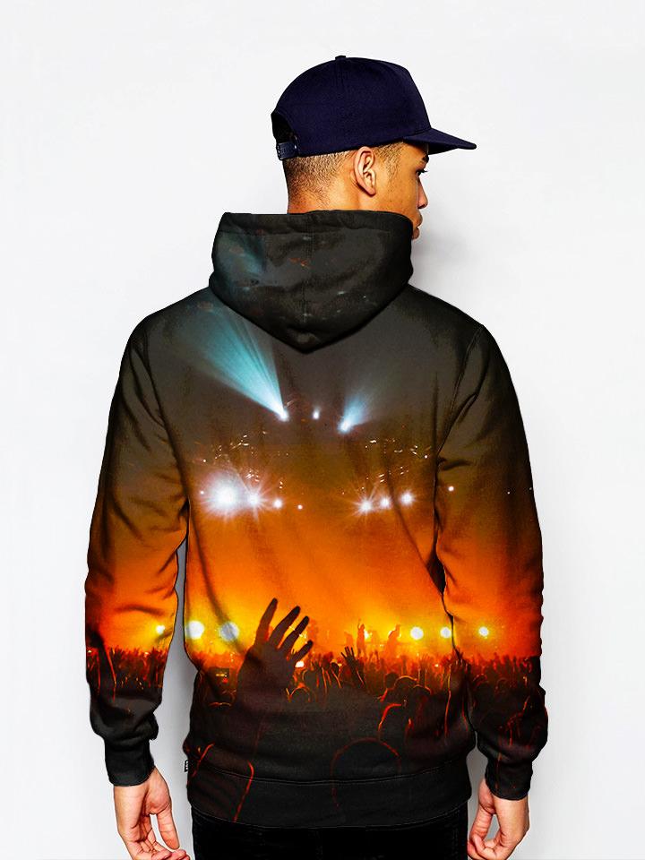 Model in pullover hoodie with crowd silhouette in red concert lights all over print