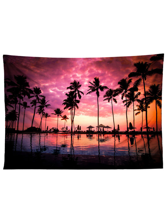Horizontal hanging view of all over print pink & black tropical sunset tapestry by GratefullyDyed Apparel.