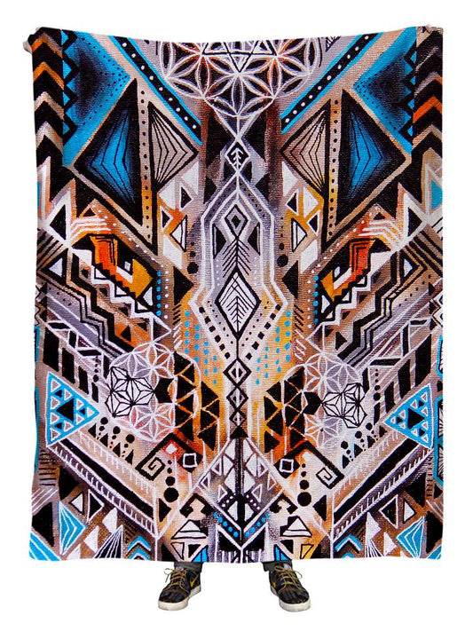Hanging view of all over print orange, blue & white tribal sacred geometry blanket by GratefullyDyed Apparel.