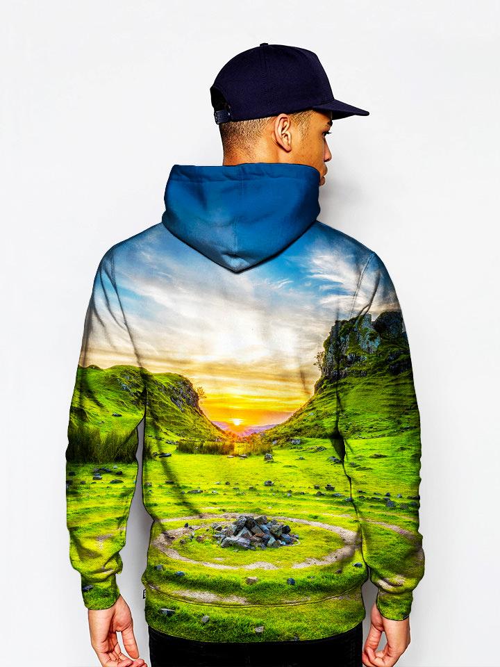 Model In Vivid Sunset Over Green Landscape Pullover Hoodie Back View